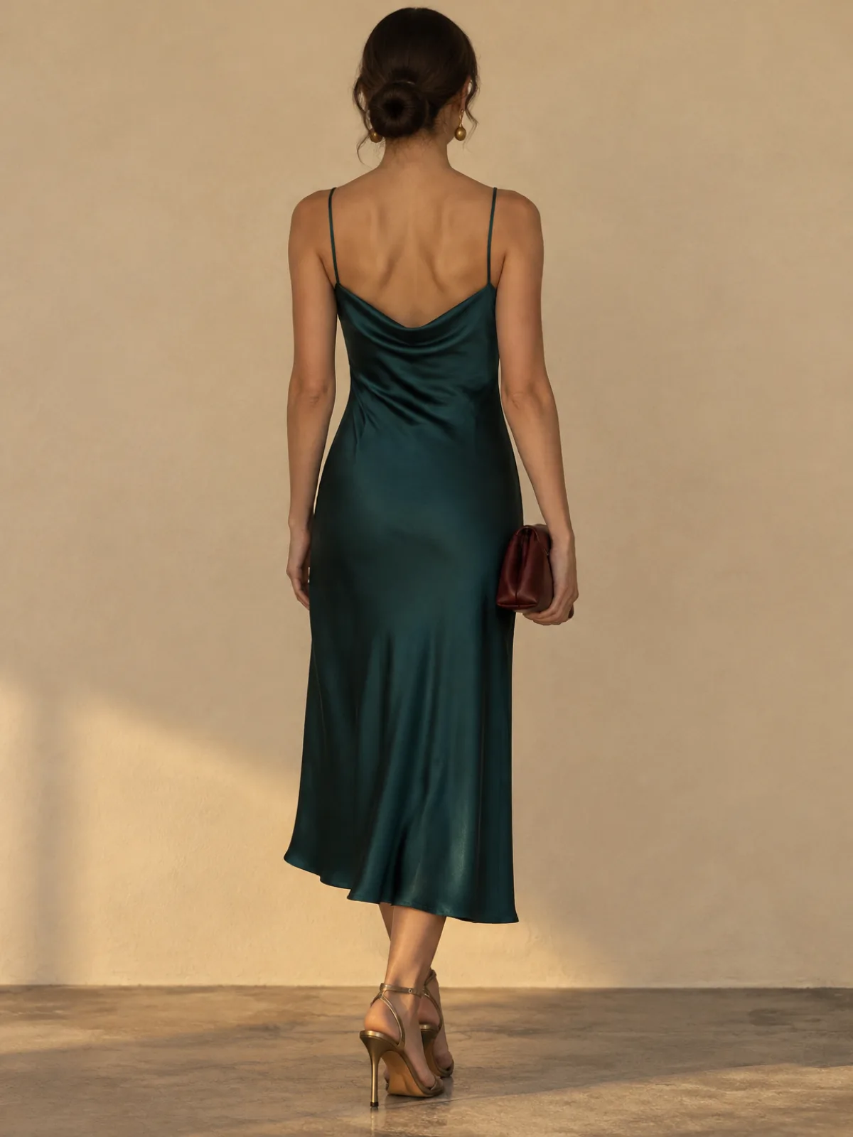 Deep Autumn evening outfit: deep teal satin dress with bronze heels